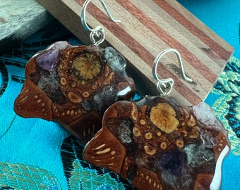 Pinecone earrings with stone inlay.