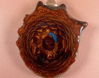 Pinecone and metallic blue inlay pendant