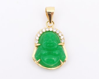 May include: A gold pendant featuring a green jade Buddha figurine with a sparkling clear crystal halo.