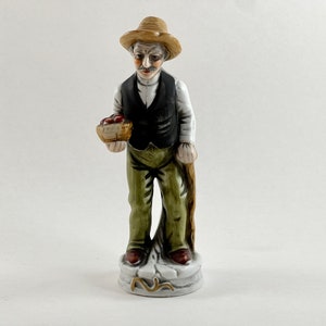 Vintage 1980s Bisque Porcelain Hand Painted Old Man Holding A Basket Of Apples Figurine