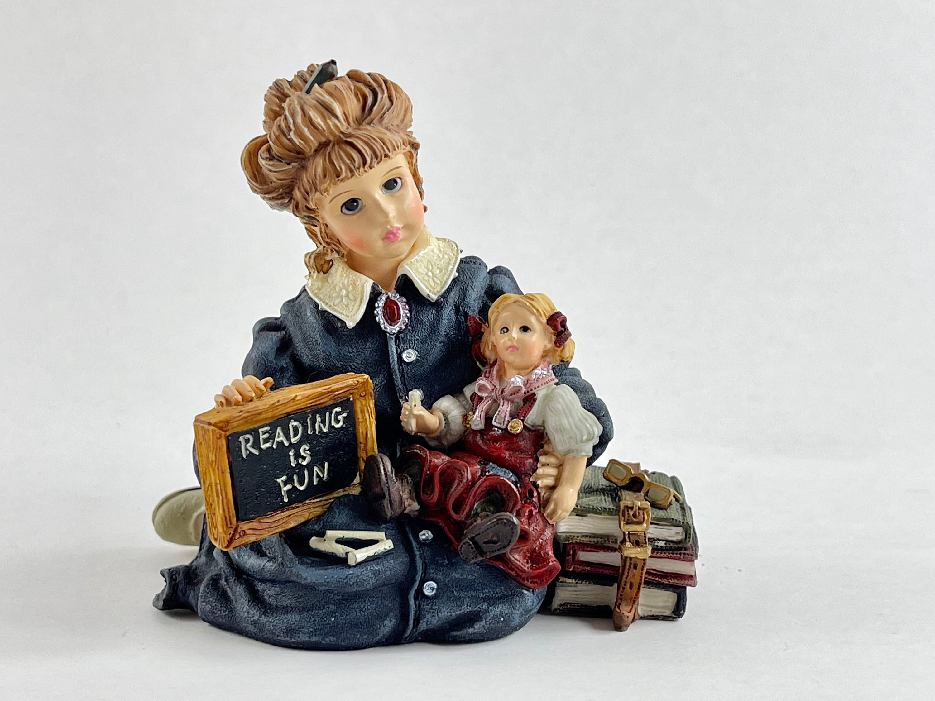 Vintage Boyd's Resin Figurine: Michelle with Daisy, Reading is Fun