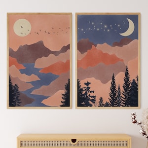 Pode incluir: Duas impressões abstratas de paisagens com uma cordilheira, árvores e uma lua ou estrelas no céu. As impressões são em tons de azul, rosa e marrom.