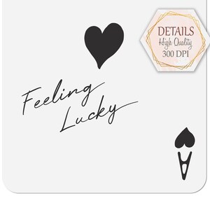 May include: Black and white graphic design with the text "Feeling Lucky" and two hearts. The graphic is on a white background.