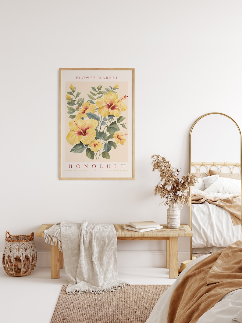 May include: A framed print with a vintage botanical illustration of yellow hibiscus flowers. The print has the text "FLOWER MARKET HONOLULU" in red.