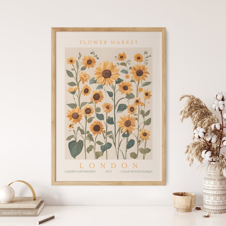 May include: A vintage-style poster with a floral illustration of sunflowers in shades of yellow and green. The poster has the text "FLOWER MARKET LONDON" and "GALERIE D'ART MODERNE NO.3 COLLECTION BOTANIQUE" at the top and bottom.