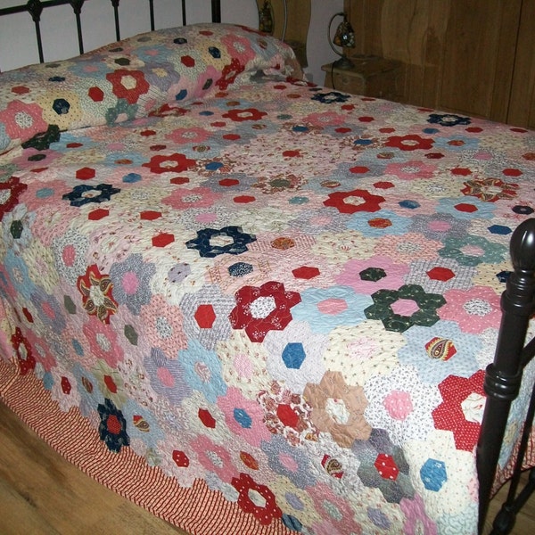 Beautiful handmade ANTIQUE patchwork made from hexagons over paper templates dated around 1900, newly made up into a king size quilt