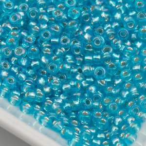 Toho Seed Beads 8/0 Light Aqua Silver Lined Rainbow (#2023) 15g 10642190