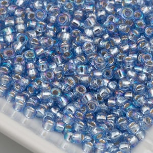 Toho Seed Beads 8/0 Light Sapphire Silver Lined Rainbow (#2033) 15g 10642194