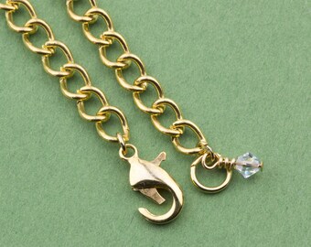 Bracelet Chain; Gold Finished 7mm Curb Link Lobster Clasp Chain Bracelet with Little Swarovski Crystal Charm; 6"-8"; 600-02-004