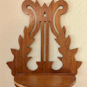 Vintage handmade wood scroll shelf