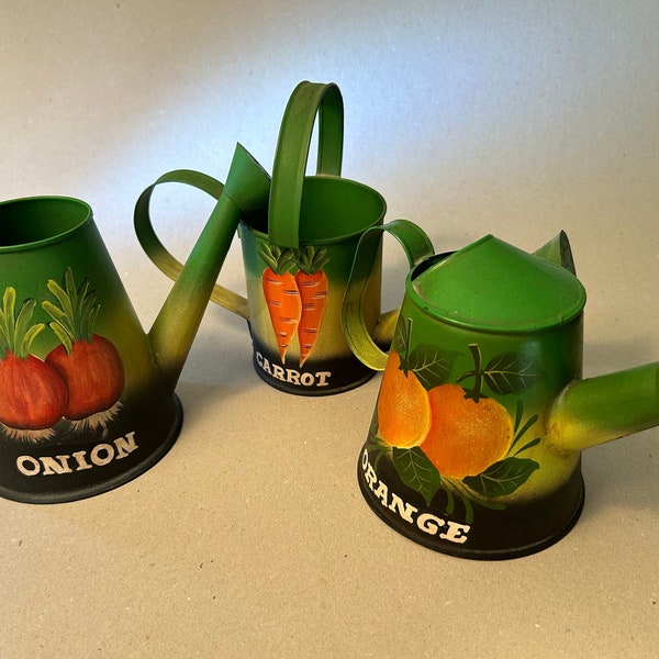 Set of three small watering cans with hand painted images featuring onions, carrots and oranges - for display or use - price includes all