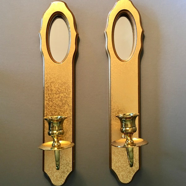 Pair of vintage wall sconces with mirrors accented with a gold metal candle holder - price includes both