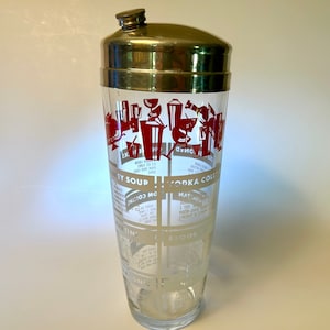 Glass cocktail shaker with drink recipes and retro graphics in red and white