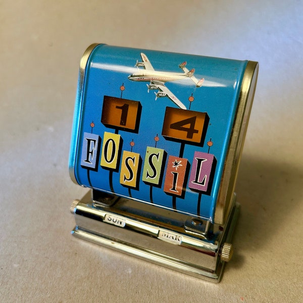 Collectible vintage Fossil “Flip-O-Matic” small metal desk top perpetual calendar