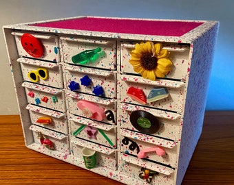 Creative hand decorated 15-drawer jewelry box with a variety of applied trinkets - originally an Akro-Mils storage case