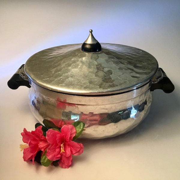 Vintage hammered aluminum casserole serving dish made in Spain with 2 quart divided glass insert by Fire-King included