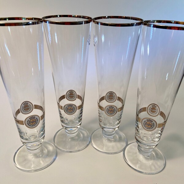 Set of four Warsteiner 0.2L footed pilsner glasses - price includes all four