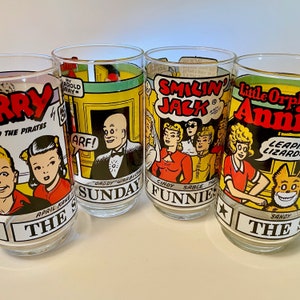 1976 collection of four &quot;The Sunday Funnies&quot; glass tumblers - Terry and the Pirates, Little Orphan Annie, Smilin&#39; Jack - price includes all