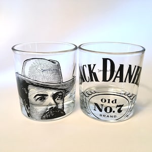Pair of vintage Jack Daniel&#39;s Old No. 7 Brand rocks glasses accented with embossed base