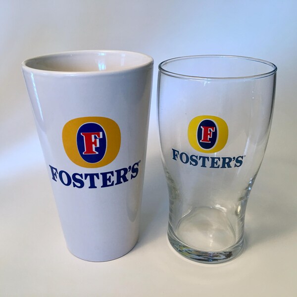 PRICE INCLUDES BOTH! Collection of two Foster's beer glasses - one solid white and one clear