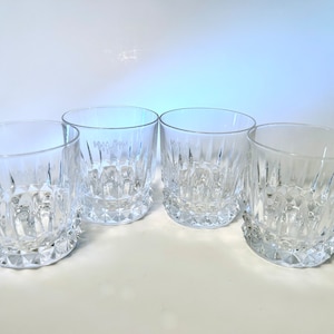 Set of 4 or 8 vintage clear cut old fashioned glasses with subtle etched people on one side