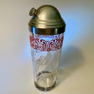 Retro glass cocktail shaker set with red filigree design and old fashioned images in white