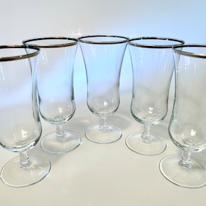 Set of five vintage elegant glasses with smooth stem and silver platinum rims