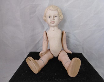 Adorable vintage French 6 1/2" china doll. Hand painted bisque. No chips, cracks or repairs