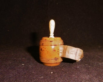 Rare tiny little antique French barrel tape measure. Carved boxwood.