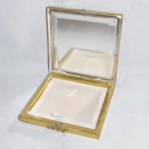 Vintage French gold tone square powder compact. Good used condition.