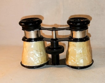 Vintage pair of reproduction faux mother of pearl opera glasses.