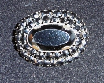 Vintage Czechoslovikian black glass brooch. Marked "Tchecoslovaquie"