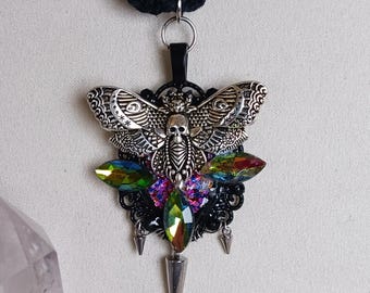 Black Hemp necklace with glitzy mulitishimmer ornate moth hanging pendant.