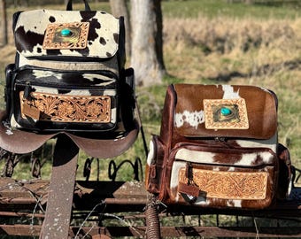 Mochila de piel de vaca auténtica de estilo occidental, bolso para pañales, artículo personal para llevar en el equipaje de mano