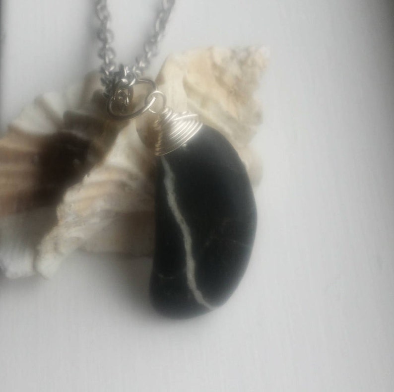 Polished Black with Brown Speckles with White Quartz Streak Oblong Beach Stone Sea Stone Wire Wrapped Pendant Opera Length Necklace