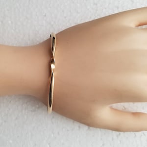 Solid brass cuff bracelet with twist