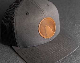 Howling Wolf Silhouette Hat | Leather Patch Trucker Style Hats for Men and Women | Wolf Apparel | Hiking Outdoor Adventure Hat | Valentine's