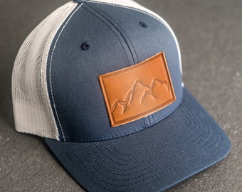 Mountain Range Hat | Leather Patch Trucker Style Hats for Men and Women | Hiking Outdoor Apparel | Adjustable Snapback | Gift Ideas