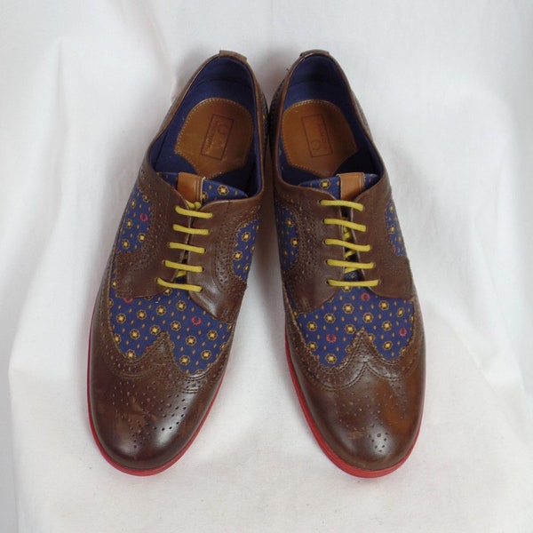 vintage FRED PERRY floral and brogued leather red athletic sole wingtip lace ups/ contrasting yellow laces/made in  Portugal: US 10.5 men