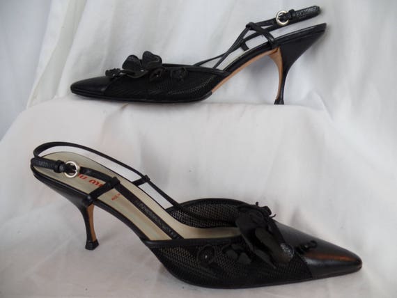 MIU MIU ICONIC Black Silver Metal Embellished Floral Bow