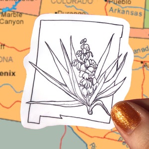 May include: A set of three ceramic mugs with a speckled, matte finish. The mugs are in shades of cream, light gray, and dark gray. Each mug has a simple, minimalist design, perfect for coffee or tea.