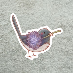 May include: A cartoon illustration of a blue bird carrying a purple flower in its beak. The bird has a white belly and a black eye.