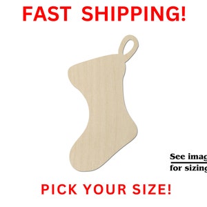 May include: A wooden Christmas stocking cutout with a loop for hanging. The text "FAST SHIPPING!" and "PICK YOUR SIZE!" are in red. The text "See images for sizing!" is in black.