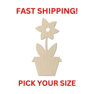 May include: A light-colored, flat wooden cutout in the shape of a potted flower with a single stem, two leaves, and a six-petaled blossom featuring a circular hole in the center. The text FAST SHIPPING! and PICK YOUR SIZE appears in red.