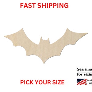 May include: A wooden bat cutout with a light brown finish. The bat has outstretched wings and a pointed head. The text "FAST SHIPPING" and "PICK YOUR SIZE" are in red. The image also includes the text "See images for sizing!" and a small American flag.
