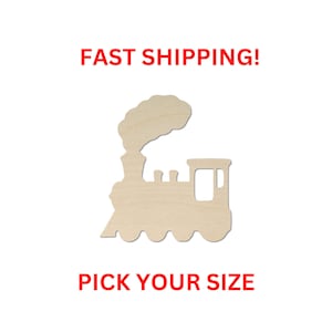 May include: A light-colored, unfinished wooden cutout in the shape of a steam locomotive train with a plume of smoke rising from the smokestack. The train silhouette features a rounded front, a cabin window, and four wheels along the bottom edge.