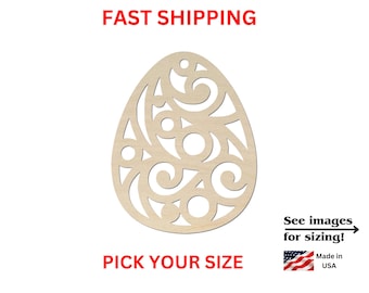 May include: A light-colored wooden egg-shaped cutout featuring an intricate laser-cut design of swirling lines and circular shapes. The cutout includes a small hole at the top for hanging. The text reads FAST SHIPPING, PICK YOUR SIZE, See images for sizing!, and Made in USA.