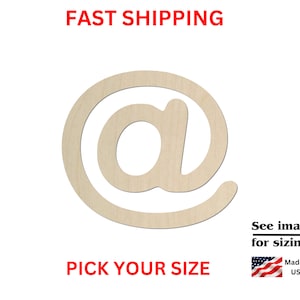 May include: Wooden cutout of the at symbol, a common symbol used in email addresses. The symbol is made of unfinished wood and is available in various sizes.
