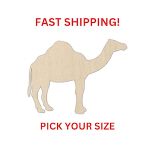 May include: A light-colored wooden cutout in the shape of a camel. The text FAST SHIPPING! is printed in red above the camel, and the text PICK YOUR SIZE is printed in red below the camel. The camel silhouette has a single hump and four legs.