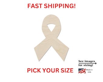 May include: A light-colored wooden awareness ribbon cutout with a smooth surface and visible wood grain. The text FAST SHIPPING! appears in red at the top, while PICK YOUR SIZE is in red at the bottom. Includes an arrow pointing to See images for sizing! and a small American flag icon with the text Made in USA.